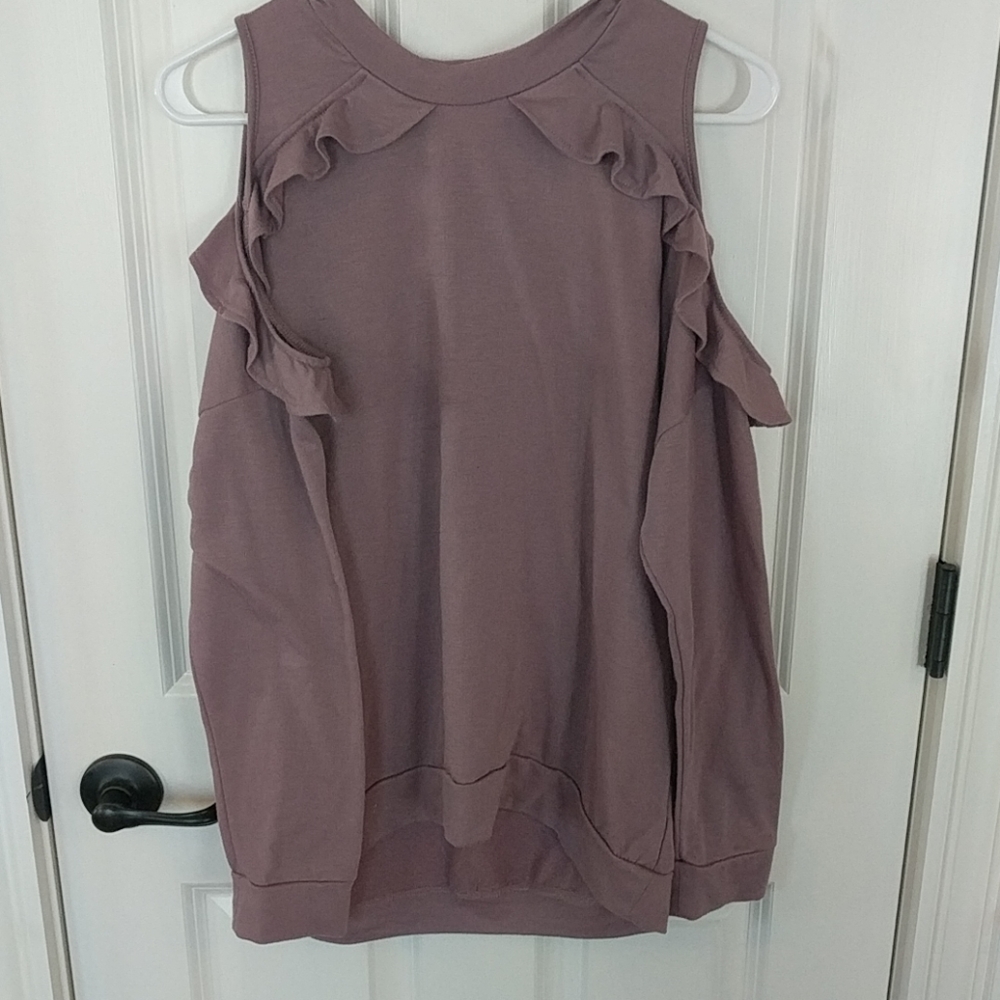 Shoulder cutout maybe sweatshirt